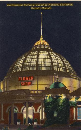 Colorized photograph of a domed building at nighttime. Sign over the door reads "Flower Show."
