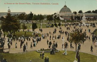 Colorized photograph of crowds of people waling on roads in front of large arenas, one with a l ...