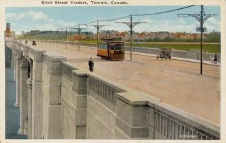 Colorized photograph of cars, people and a streetcar crossing a concrete and steel bridge.