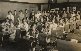 Class picture of children in their school class room. 