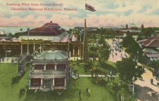Colorized photograph of exhibition buildings set on vast acres of grounds.