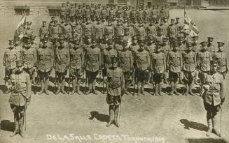 Black/white photo postcard depicting the army cadets of De La Salle Catholic Boys School in Tor ...