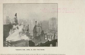 Black and white photo postcard depicting an inset photo of buildings damaged by the 1904 fire o ...