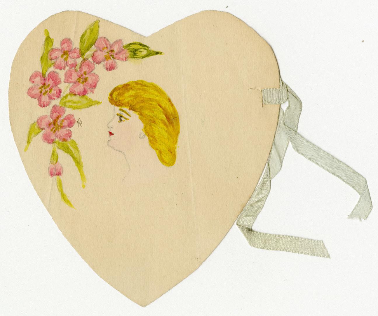 A handmade heart with a watercolour portrait of woman in profile. She is looking at spray of pi ...