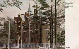Colorized photograph of a large building of late Victorian design.