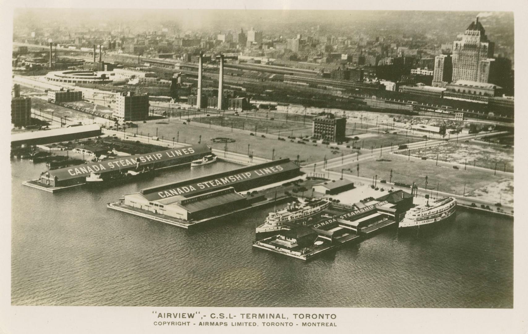 Black and white photo postcard depicting Canada Steamship Lines Docks on the Toronto Harbourfro…