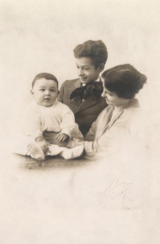 Black and white photograph of Augustus N. Abbott, Wilson H. Abbott, and unknown woman.