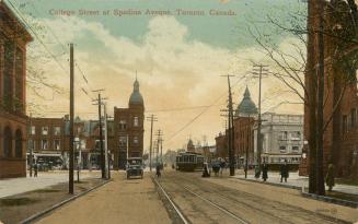 Colorized photograph of automobiles and people and a streetcars traveling on a busy city street ...