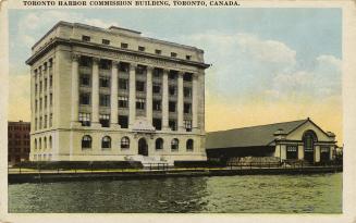 Colorized photograph of a six story building of Beaux-arts architecture resting on the shorelin ...