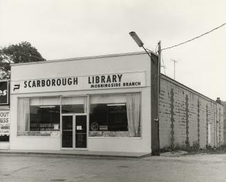Picture of exterior of storefront library branch. 