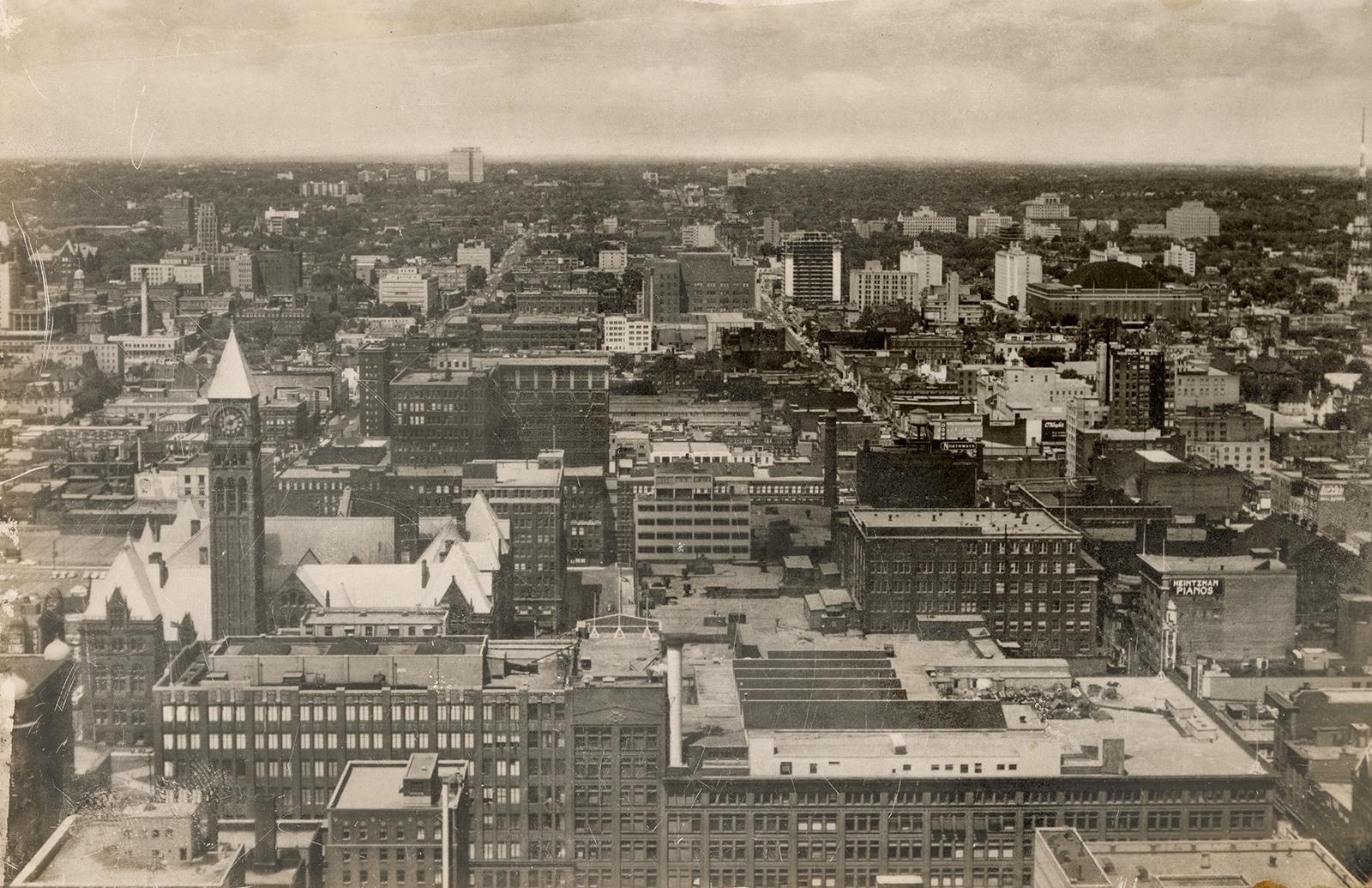 Black and white, aerial photograph of a large city.