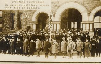 Black and white picture of dignitaries standing on the steps of large, Richardsonian Romanesque ...