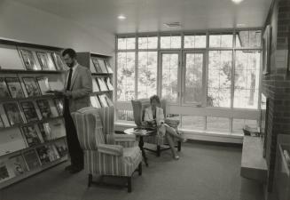 Picture of interior of library showing large window. 