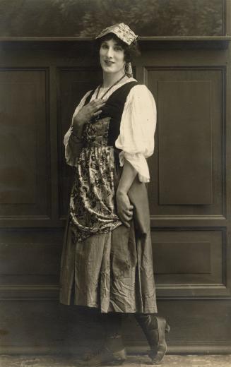 Black and white photograph of Allan Murray of the Dumbells in costume as Marie.