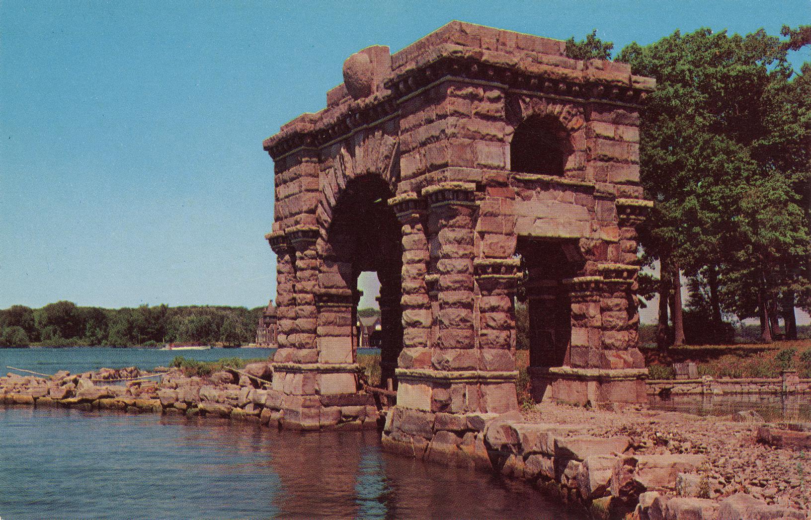 Colorized photograph of large stone arch beside a river.