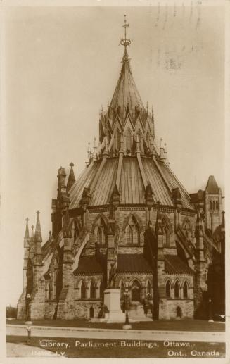 Picture of round library building with detailed pointed roof. 