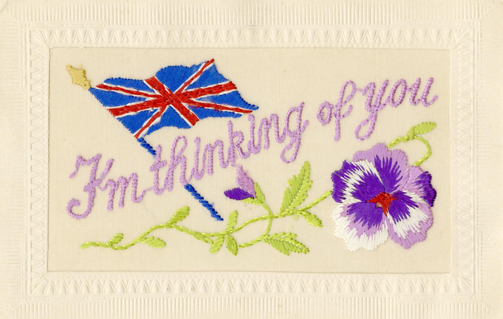 Silk embroidery of a Union Jack flag and a purple pansy. "I'm thinking of you is embroidered in ...