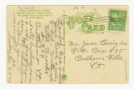 Sepia-toned postcard depicting the exterior corner of a 3-story fur store on Yonge Street. Ther…