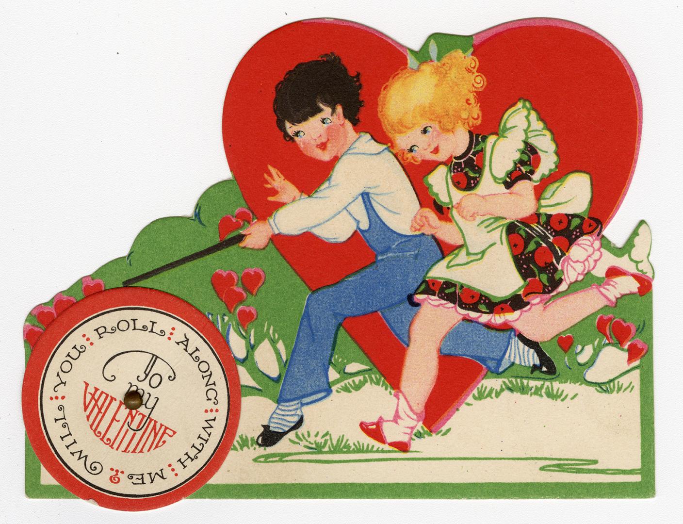 A mechanical card.A boy and girl run side by side through the grass pushing a wheel in front of ...