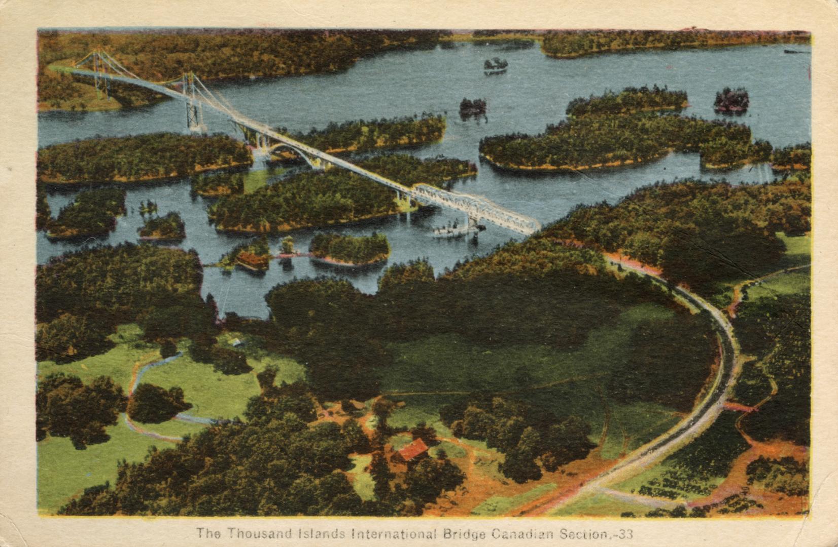 Colorized aerial photograph of a bridge spanning a river over many islands.