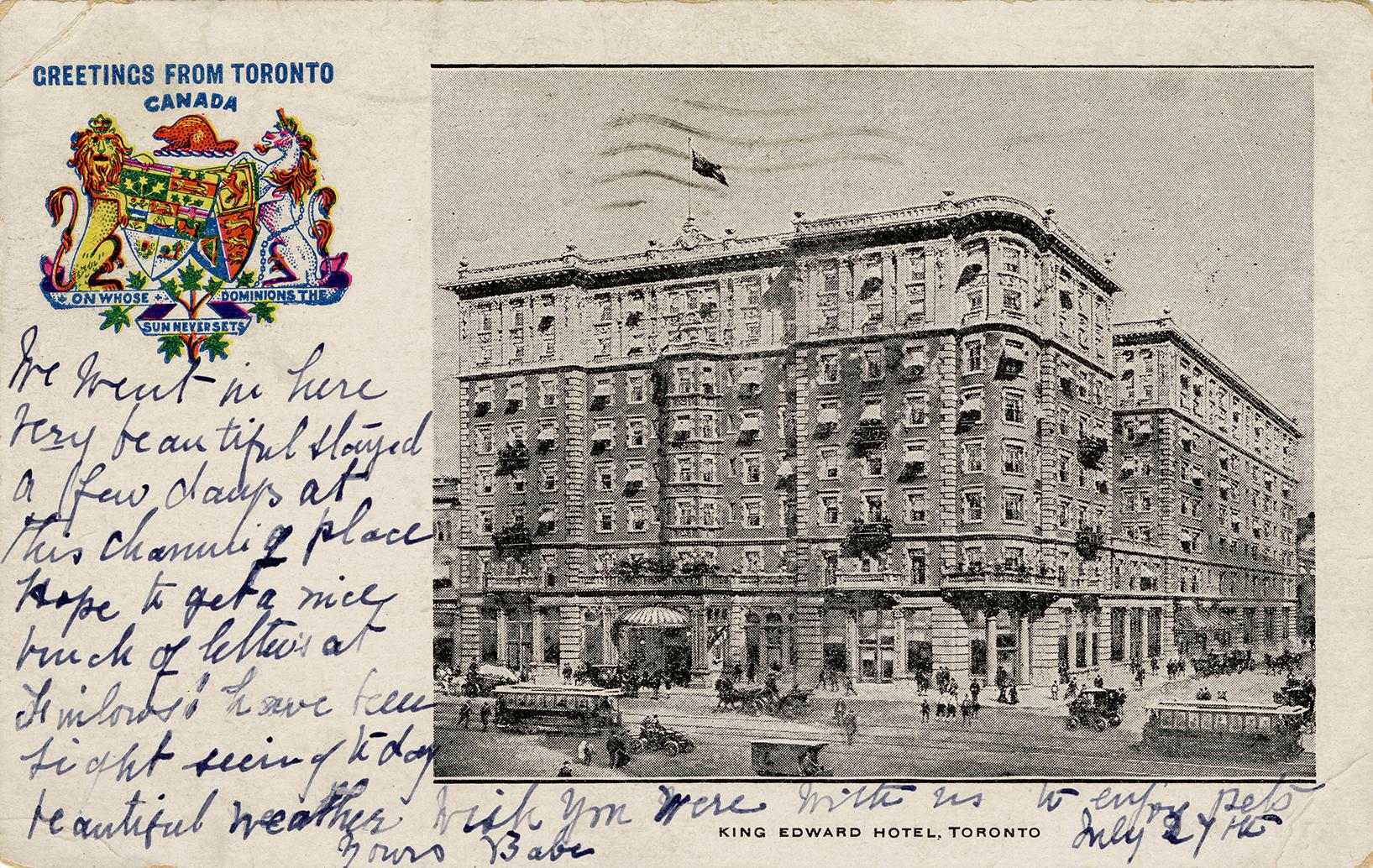 Black and white photograph of a large, multi story public building.