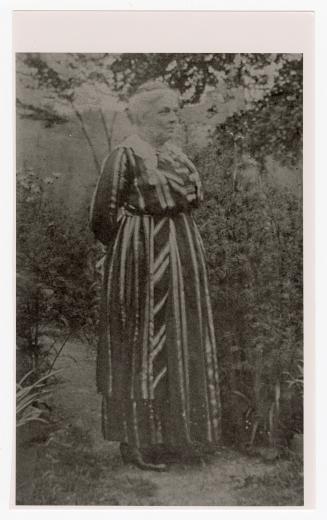 Black and white reprographic copy of Mary Ann (Casey) Abbott in garden