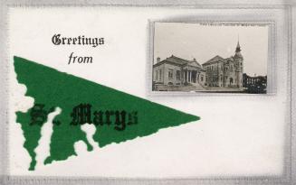 Green felt flag with wording and small photo of library and town hall in upper right corner of  ...