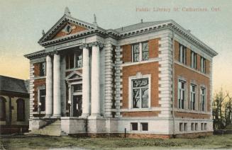 Picture of two storey library building with front pillars and portico. 