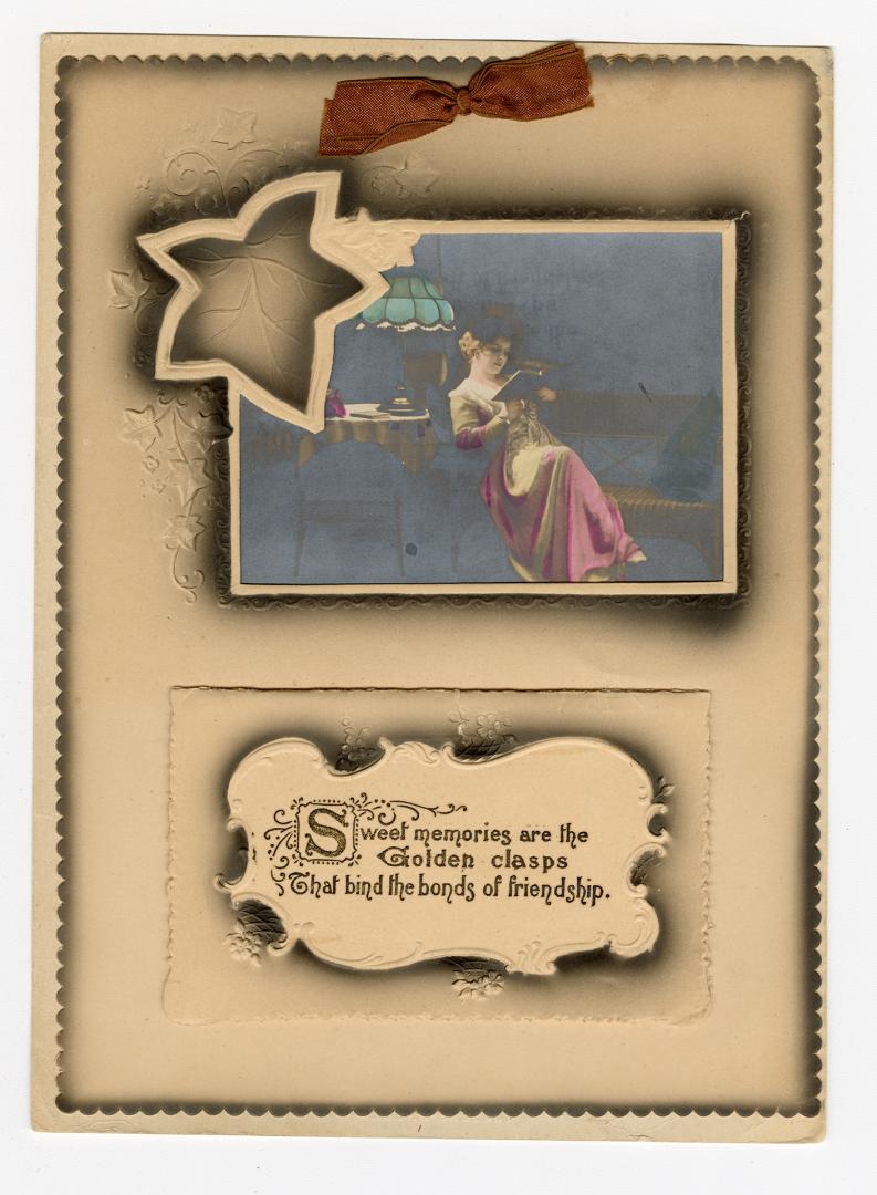 At it's centre this card holds an original, hand-coloured photographic print of a woman in a dr ...