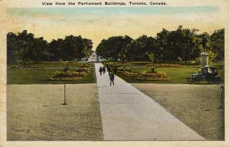 Colorized photograph of people walking on a wide path in a park.