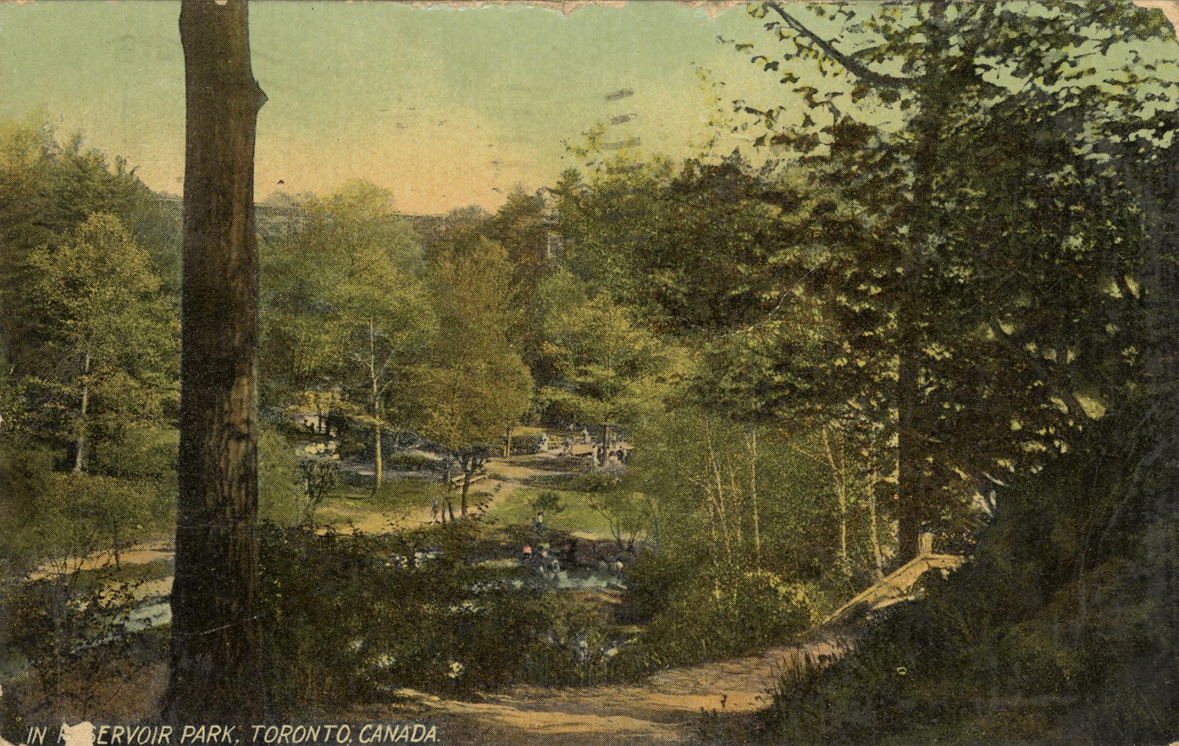 Colorized photograph of people walking on a wide path in a park.