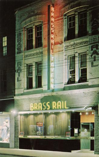 Colour photo postcard depicting the exterior frontage of a restaurant with big windows, with cu ...