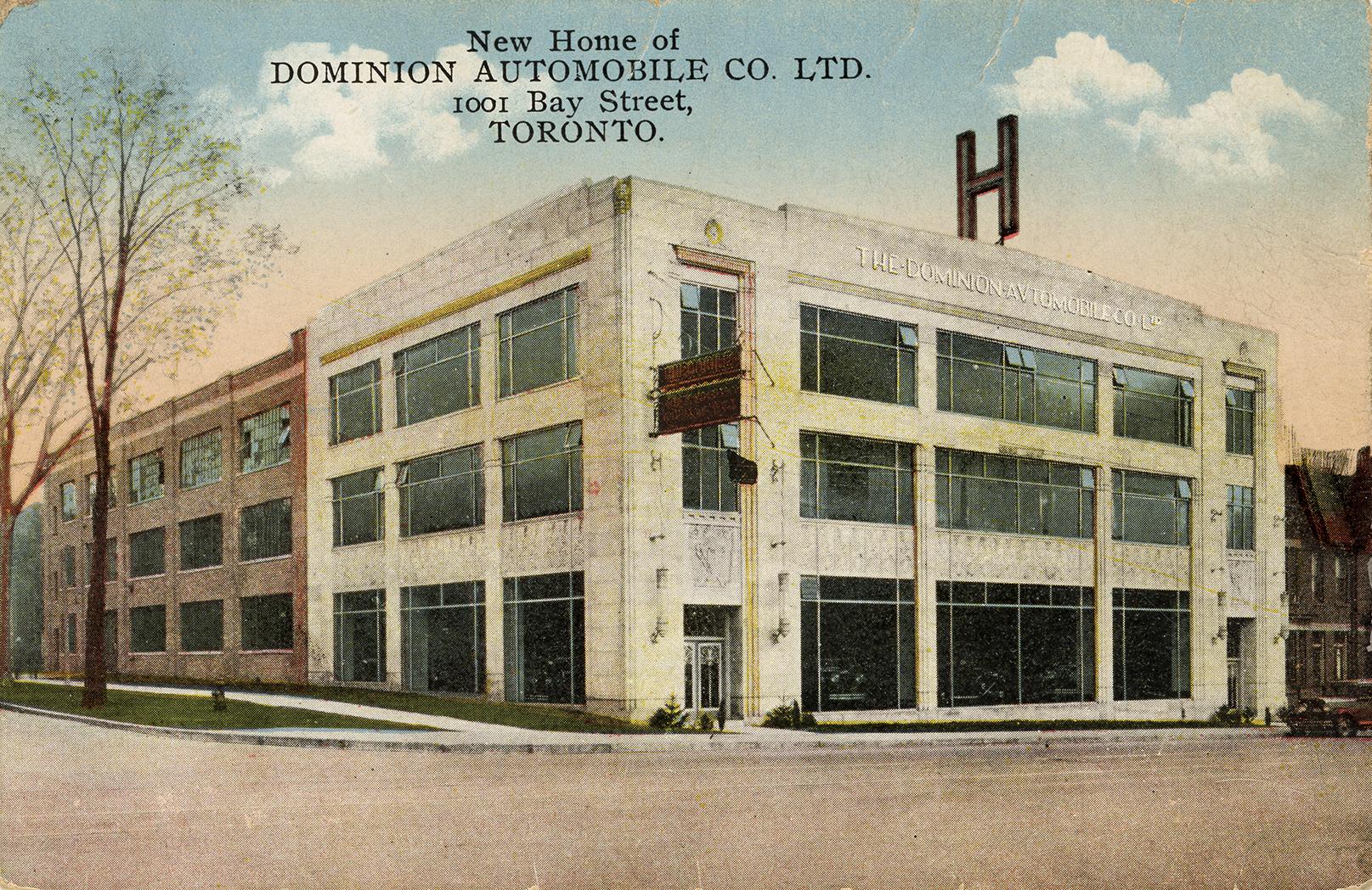 Colorized photograph of a three story factory showroom.