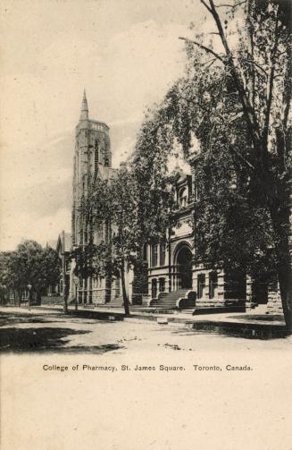 Black and white photograph of a large, Victorian, collegiate building with a turret.