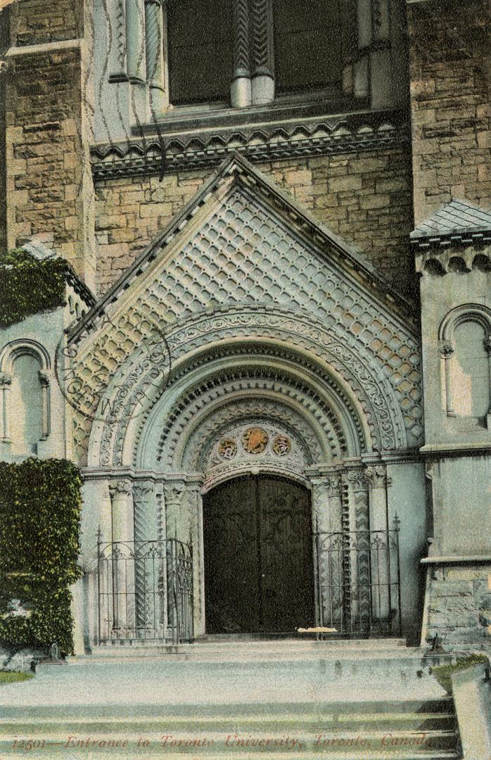 Black and white photograph of a huge, highly stylized, stone doorway.