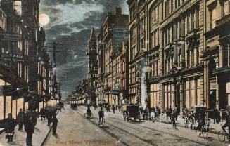 Colorized photograph of a city street with tall office buildings and skyscrapers on either side ...