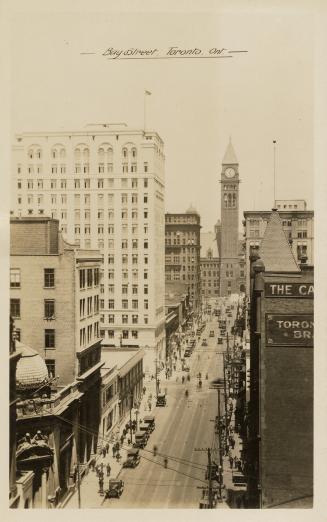 Black and white aerial photograph of a large city.