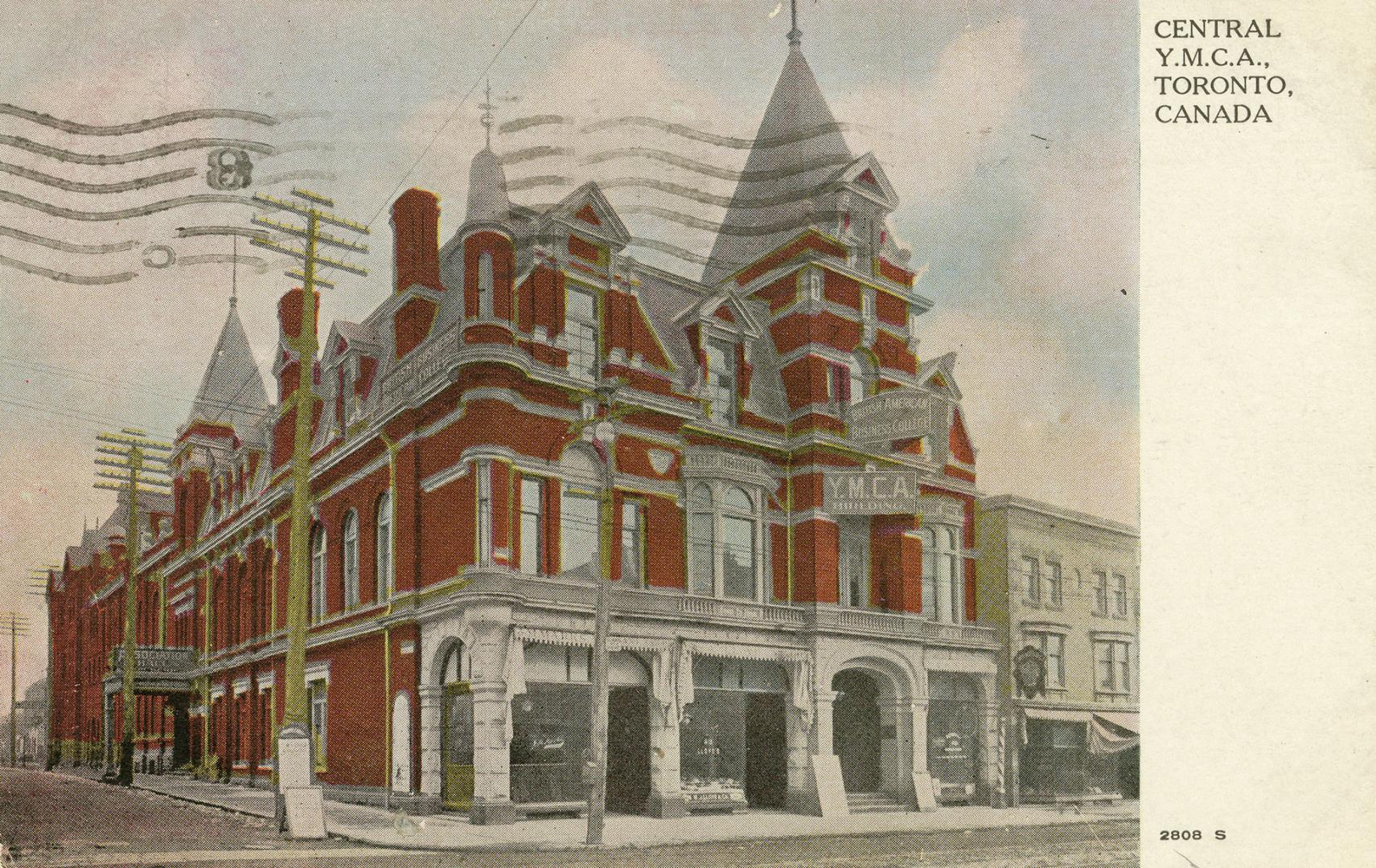 Colorized photograph of a large building constructed in the Richardsonian Romanesque style of a ...