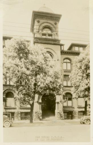 Black and white photograph of a large building constructed in the Richardsonian Romanesque styl ...