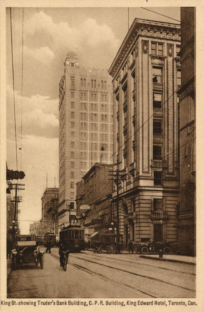 Sepia-toned photo postcard of a view of King Street West, looking east from Jordan Street, with ...