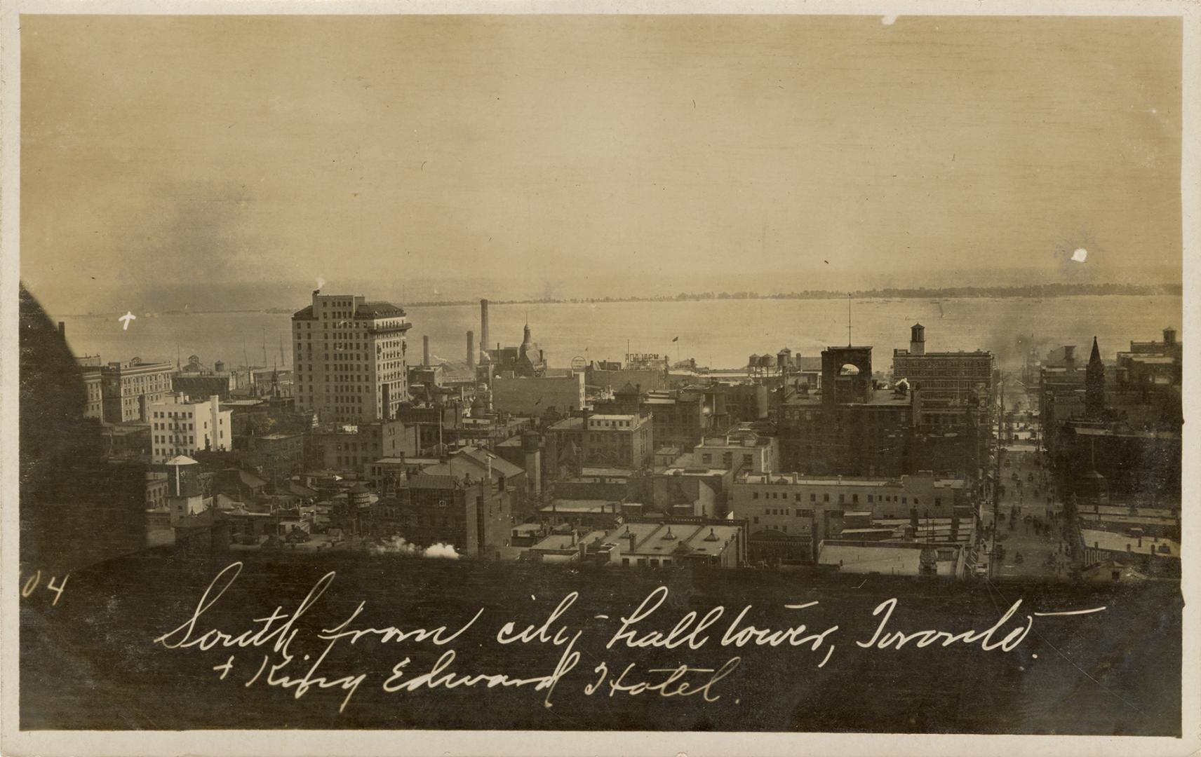 Black and white photo postcard depicting an aerial view of Toronto showing Lake Ontario in the  ...