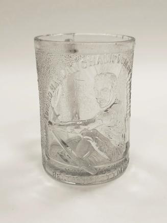 A pressed glass tankard issued by Henry Greener Glass to commemorate Edward "Ned" Hanna's victo ...