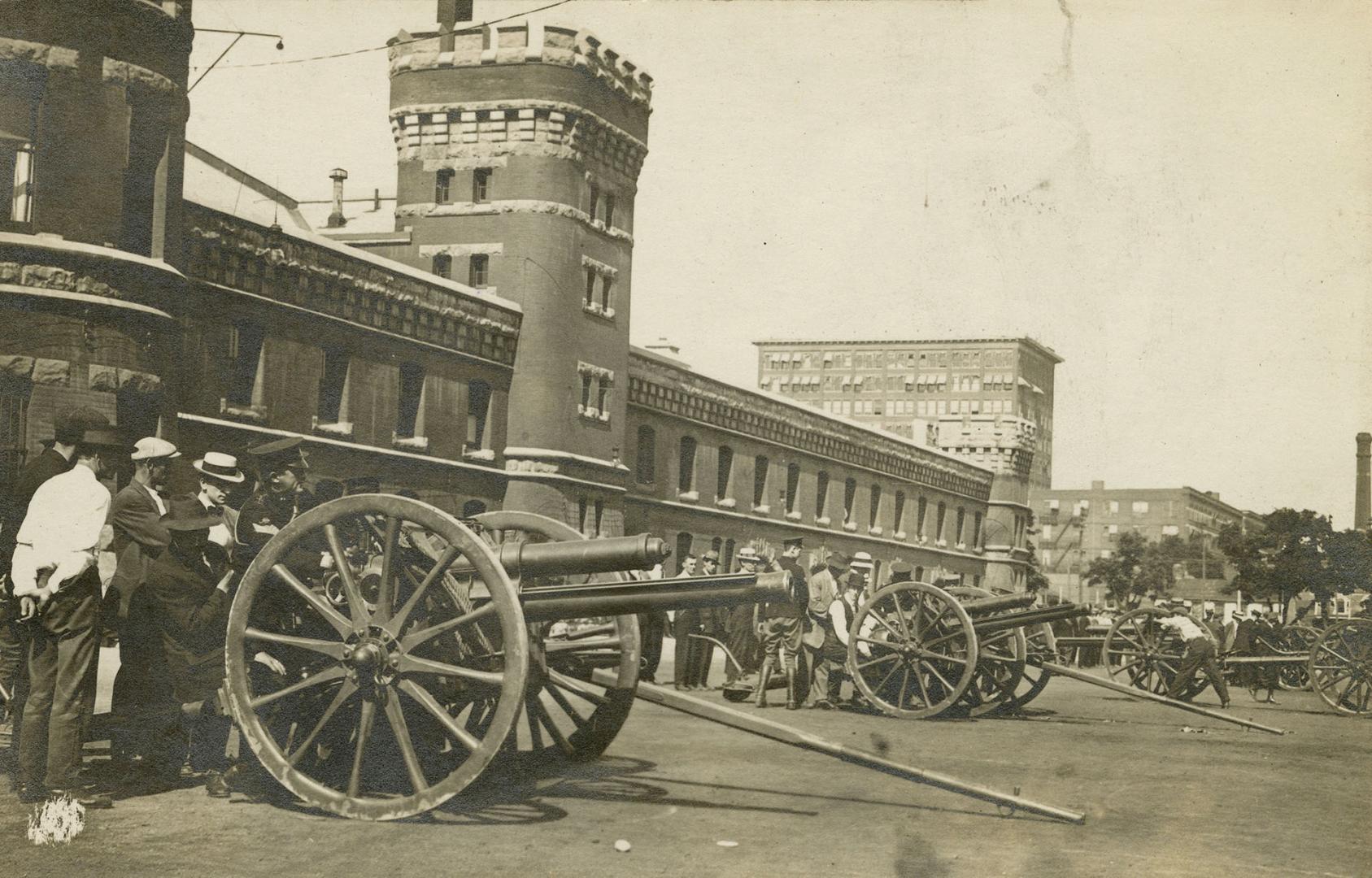 Black and white photo postcard depicting the exterior south facade of the University Avenue Arm…