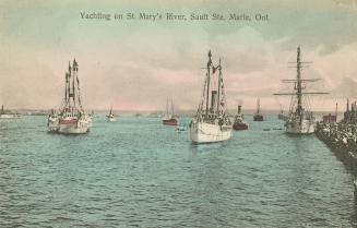 Colorized photograph of many large boats on open water.