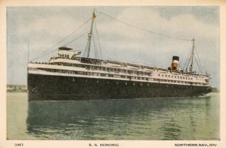 Color photograph of a large boat in open water.