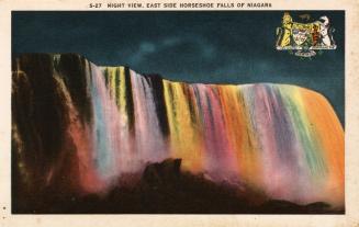 Colorized photograph of a waterfall with spotlights on it, taken at night.