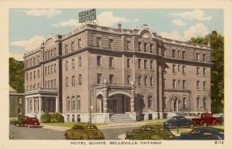 Colorized photograph of a four story public building.