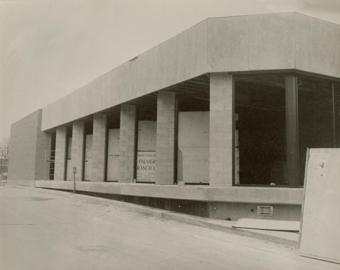 Picture of a one storey library under construction. 