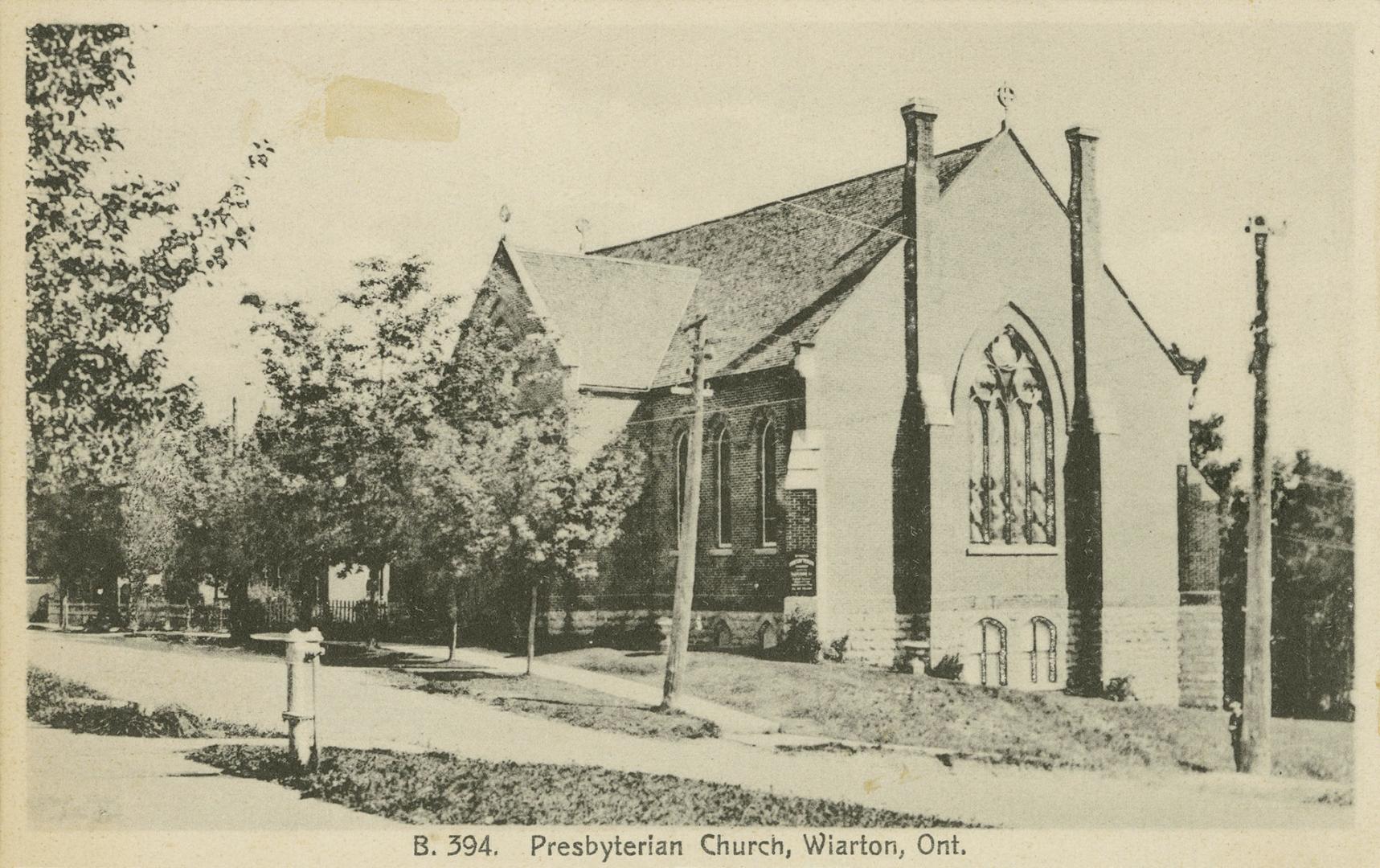 Black and white photograph of a church in the gothic style.