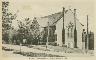 Black and white photograph of a church in the gothic style.